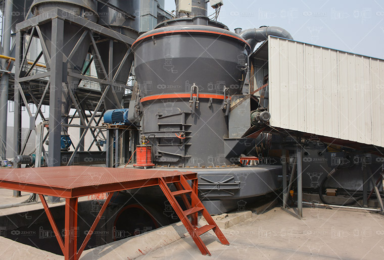 Aerial overview of a complete mineral grinding plant installation featuring multiple grinding mills and processing equipment.