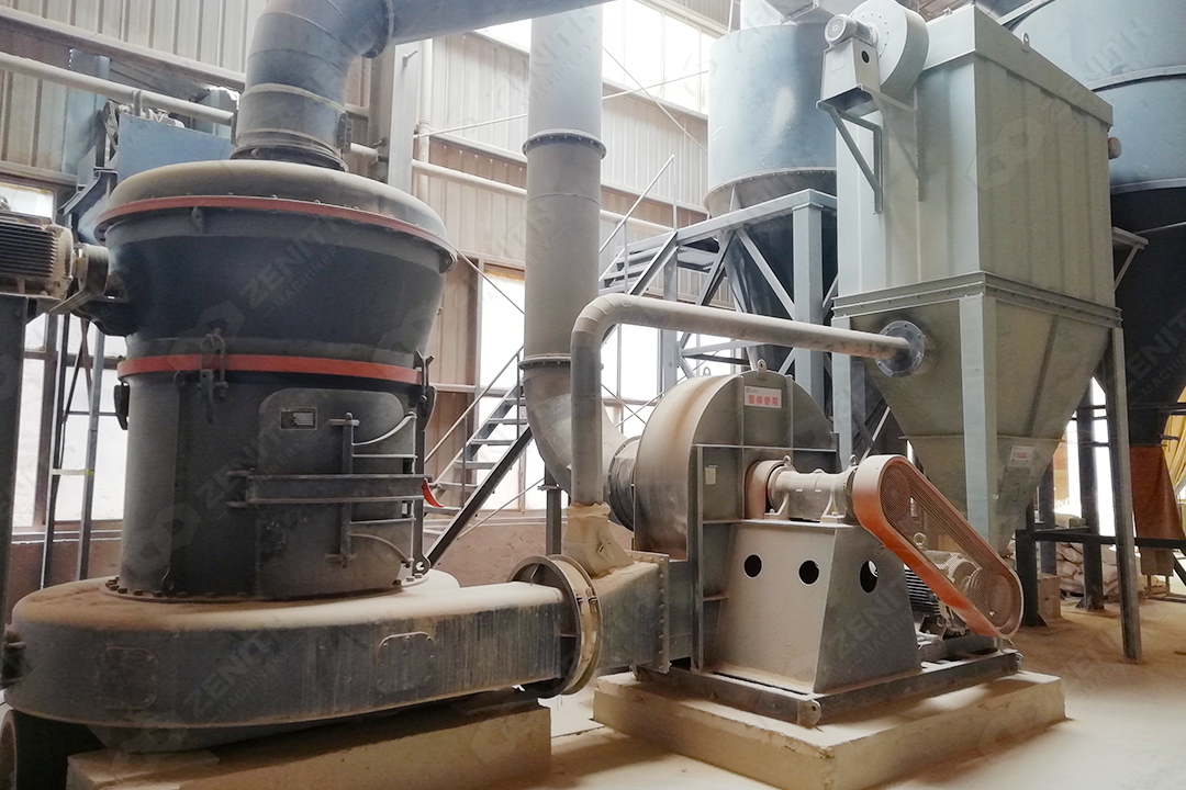 Operator monitoring an advanced touch-screen control panel for a Zenith grinding mill system