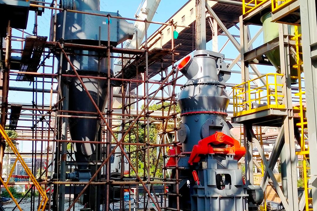 A large LM Vertical Grinding Mill installed in an industrial plant, showing its compact vertical structure.