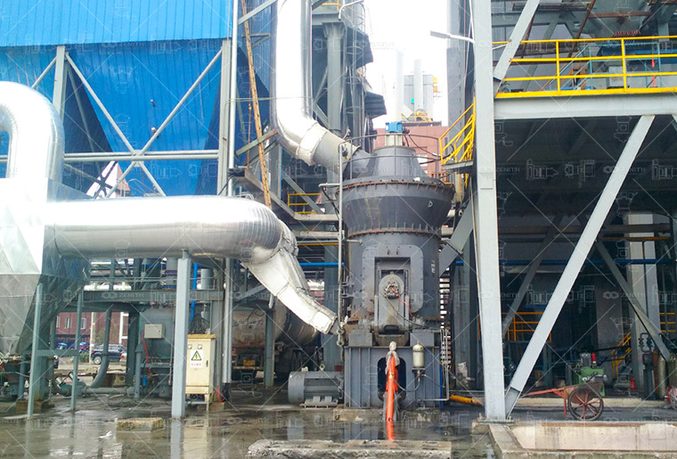 ZENITH engineer conducting on-site training for Bangladeshi plant operators on the maintenance and operation of a vertical grinding mill.